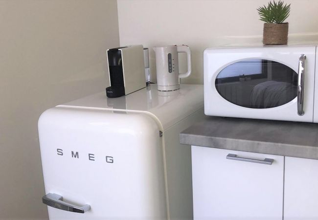 Aparthotel in Annecy - Showroom La bulle garage courrier Aparthotel in Annecy - Showroom La bulle garage courrier